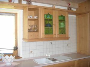 Kuchyň nebo kuchyňský kout v ubytování Albergo Garni' Laura