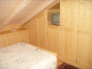 Postel nebo postele na pokoji v ubytování Albergo Garni' Laura