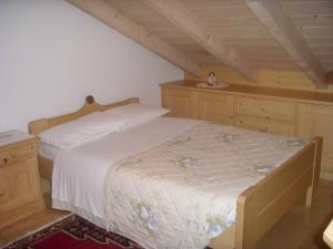Postel nebo postele na pokoji v ubytování Albergo Garni' Laura