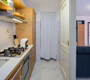 A kitchen or kitchenette at Appartamento Zappacenere