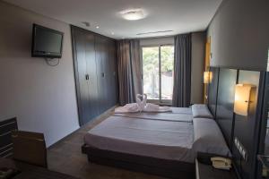 Postel nebo postele na pokoji v ubytování El Chalet