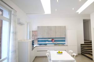 Una cocina o zona de cocina en Casa Ancona - Splendido appartamento