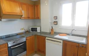Kuchyňa alebo kuchynka v ubytovaní Apartamento Talima 6 PAX