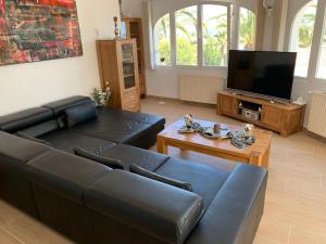 Telewizja i/lub zestaw kina domowego w obiekcie Villa Emilia 8 PAX