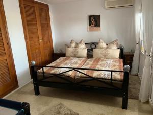 Łóżko lub łóżka w pokoju w obiekcie Villa Emilia 8 PAX