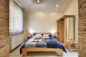 En eller flere senge i et værelse på Mimoza Old Town Pula Apartments