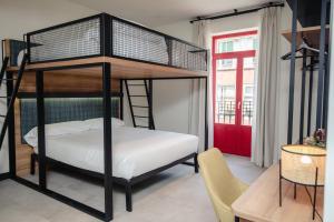Cama o camas de una habitación en LATROUPE La Granja
