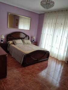 Posteľ alebo postele v izbe v ubytovaní CASA LOS ABUELOS