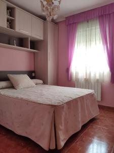 Posteľ alebo postele v izbe v ubytovaní CASA LOS ABUELOS