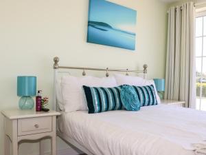 מיטה או מיטות בחדר ב-Atlantic View