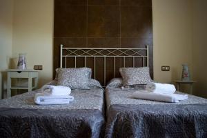 Posteľ alebo postele v izbe v ubytovaní Vivienda Turistica El Caneco