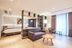 Postel nebo postele na pokoji v ubytování Eden Paradise Hotel + 37 fotografií