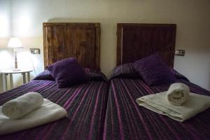 Posteľ alebo postele v izbe v ubytovaní Vivienda Turistica El Caneco