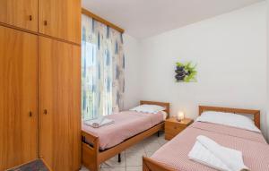 Posteľ alebo postele v izbe v ubytovaní Apartment Batana