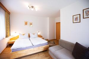 Łóżko lub łóżka w pokoju w obiekcie Ferienhaus Nationalpark