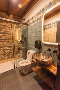Koupelna v ubytování Apartamentos Rurales Casa Llongo