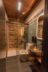 Koupelna v ubytování Apartamentos Rurales Casa Llongo