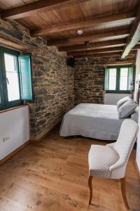 Postel nebo postele na pokoji v ubytování Apartamentos Rurales Casa Llongo