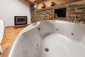 Fotografie z fotogalerie ubytování Apartamentos Rurales Casa Llongo v destinaci Coaña + 37 fotografií