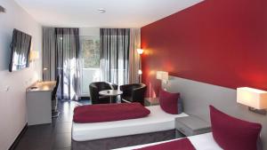 TV a/nebo společenská místnost v ubytování Hotel Zur Post