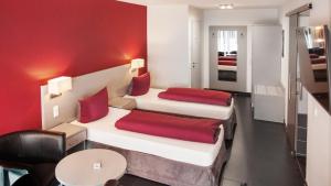 Postel nebo postele na pokoji v ubytování Hotel Zur Post