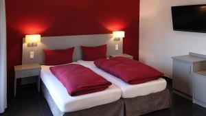 Postel nebo postele na pokoji v ubytování Hotel Zur Post