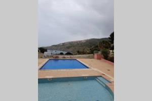 Bazén v ubytování T2 appartment with sea view and swimmimg pool. nebo v jeho okolí