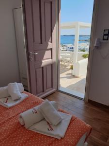 Ένα ή περισσότερα κρεβάτια σε δωμάτιο στο Katerina Apartments & Studios