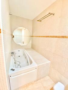 Koupelna v ubytování Wave & Chill -The House- + 44 fotografií