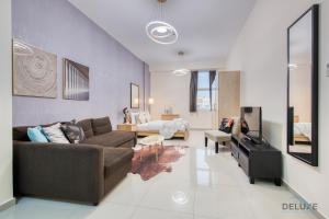 Posezení v ubytování Tranquil Studio at Madison Astor Dubailand by Deluxe Holiday Homes