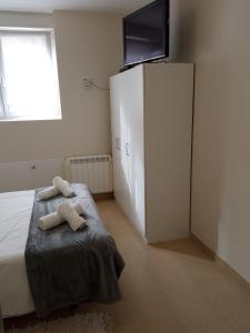 Postel nebo postele na pokoji v ubytování UGARTEKO ETXEA