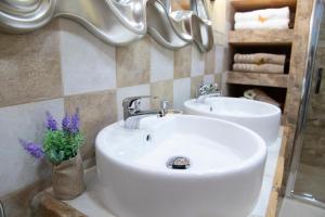 Ένα μπάνιο στο APARTAMENTO LA VEGUILLA