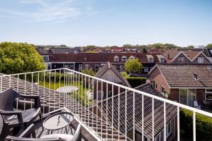 Balcony o terrace sa B&B Duinhuys