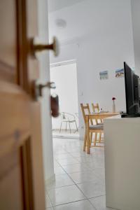TV a/nebo společenská místnost v ubytování Apartments Bacak