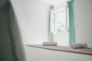 Postel nebo postele na pokoji v ubytování Apartments Bacak