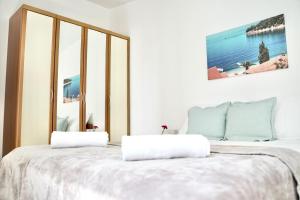Postel nebo postele na pokoji v ubytování Apartments Bacak