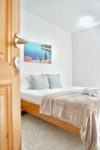 Postel nebo postele na pokoji v ubytování Apartments Bacak