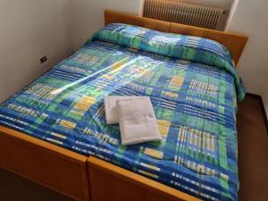 Voodi või voodid majutusasutuse Albergo Spina toas