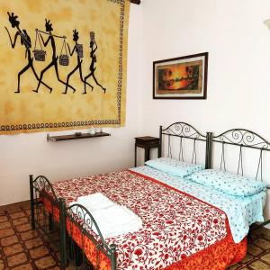 - une chambre avec un lit dans l'établissement B&B Sudest, à Acquarica del Capo