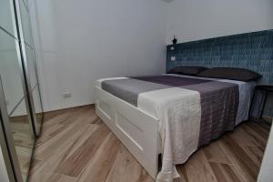 Letto o letti in una camera di B&B Sea and Garden