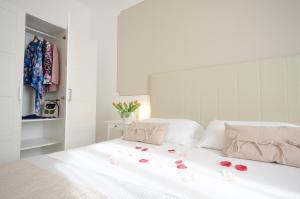 Postel nebo postele na pokoji v ubytování Hotel Al Sole Bardolino