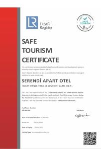 a white and red resume with a red stripe at Serendi Apart Hotel in Alanya