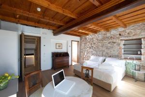 Postel nebo postele na pokoji v ubytování Casa Castagna 1620
