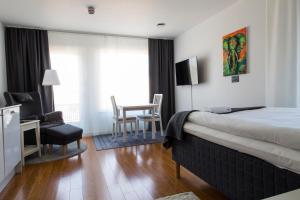 Postel nebo postele na pokoji v ubytování Continental Apartment Hotel Sollentuna