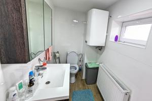 Phòng tắm tại Zur Krone - Ferienhaus 1