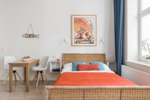 Sanhaus Apartments tesisinde bir odada yatak veya yataklar