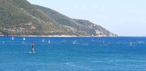 a group of boats on a large body of water at Ponti Bay Apartments in Vasiliki