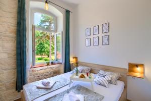 Posteľ alebo postele v izbe v ubytovaní Apartment Henna 2 Pula