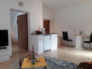 Kuchyň nebo kuchyňský kout v ubytování Ferienwohnung Am Sonnenweg