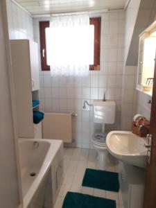 Łazienka w obiekcie Ferienwohnung Am Sonnenweg